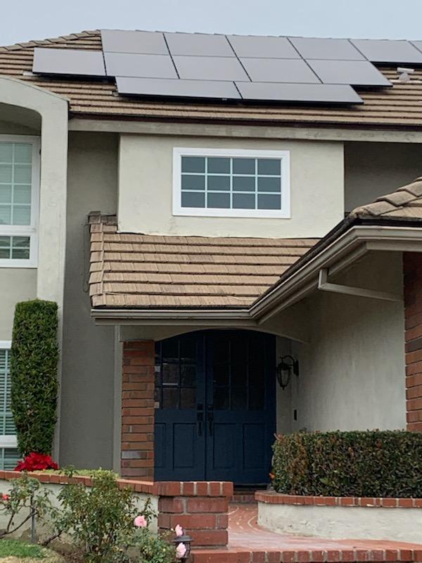 home with solar panels on it